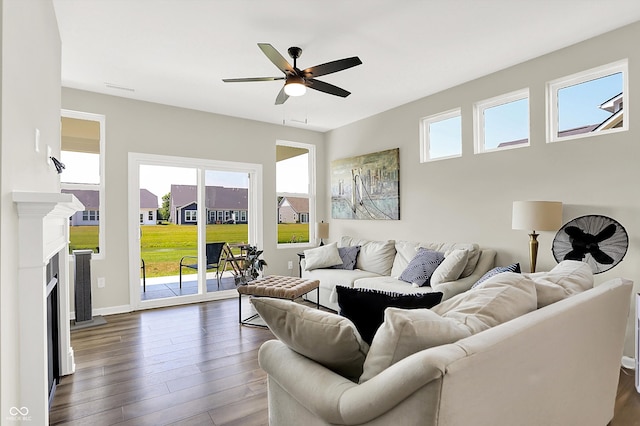887 Tuxedo Dr, Westfield, IN 46074 - living room featuring dark wood finished floors, a ceiling fan, and a fireplace