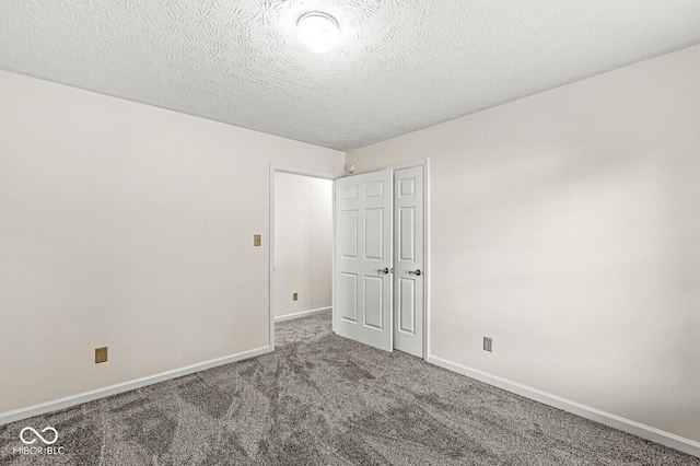3772 Brill Rd, Indianapolis, IN 46227 - carpeted spare room with baseboards and a textured ceiling