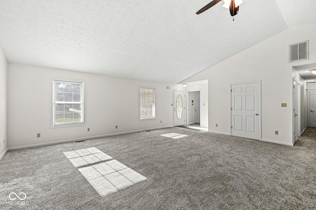 3772 Brill Rd, Indianapolis, IN 46227 - unfurnished living room with carpet flooring, a ceiling fan, a textured ceiling, and high vaulted ceiling