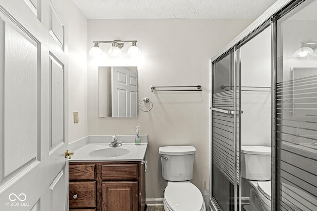 3772 Brill Rd, Indianapolis, IN 46227 - bathroom with vanity, a stall shower, and a textured ceiling