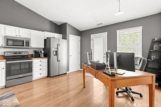 12384 Barnstone Ct, Fishers, IN 46037 - office area with vaulted ceiling and light wood-style flooring