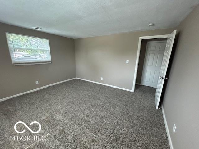2732 Morning Star Dr, Indianapolis, IN 46229 - spare room with carpet and a textured ceiling