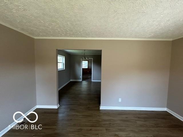 2732 Morning Star Dr, Indianapolis, IN 46229 - empty room with crown molding, dark wood-style floors, and a textured ceiling