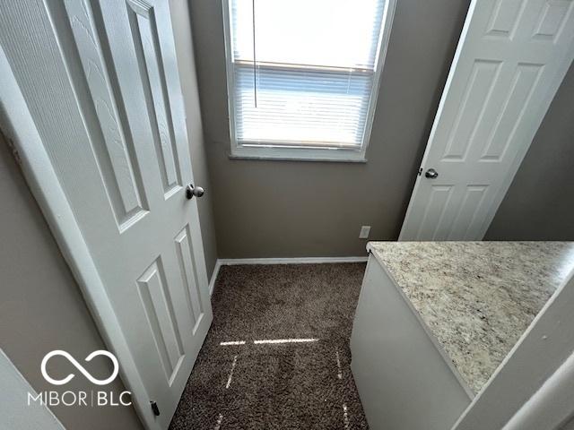 2732 Morning Star Dr, Indianapolis, IN 46229 - unfurnished bedroom with carpet flooring and baseboards