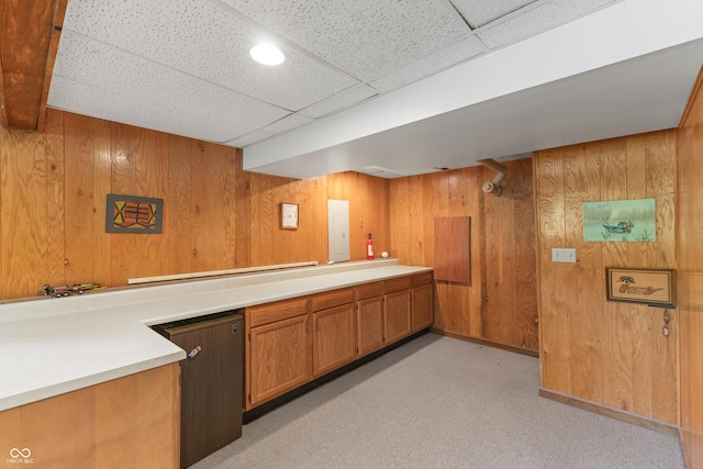 2591 S Glen Cv, Martinsville, IN 46151 - bar featuring wood walls, light carpet, a paneled ceiling, and electric panel