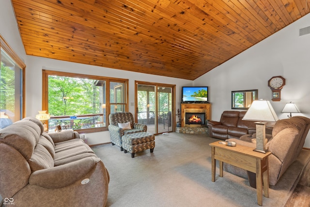 2591 S Glen Cv, Martinsville, IN 46151 - carpeted living room featuring lofted ceiling, a glass covered fireplace, and wooden ceiling