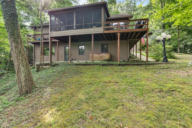 2591 S Glen Cv, Martinsville, IN 46151 - back of house with a deck, a sunroom, and a lawn