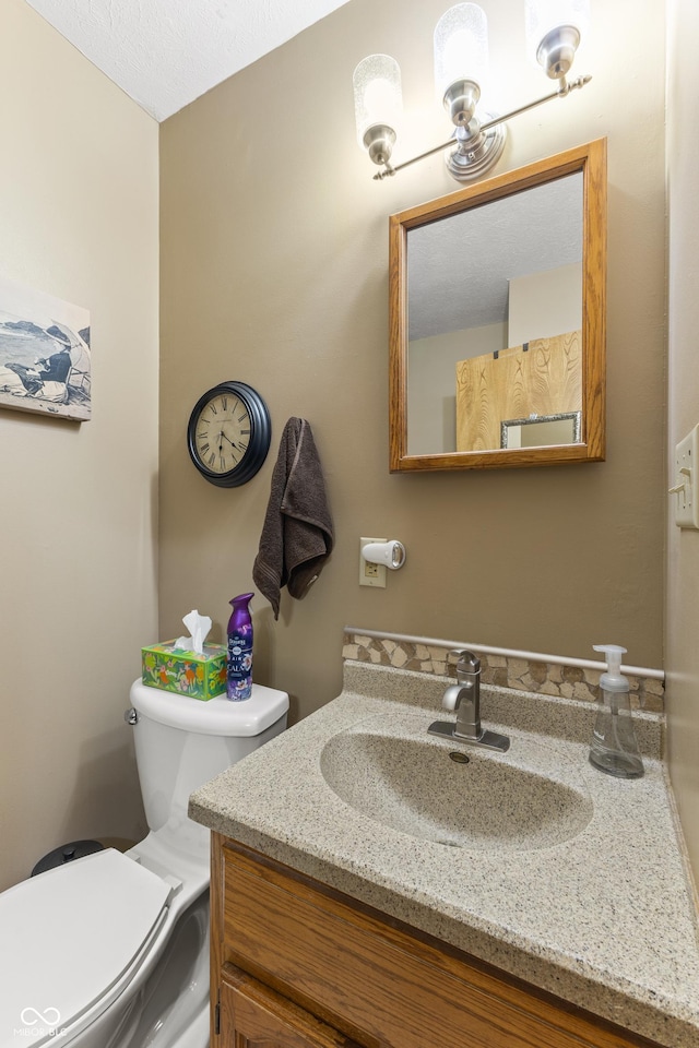 2591 S Glen Cv, Martinsville, IN 46151 - bathroom with toilet and vanity