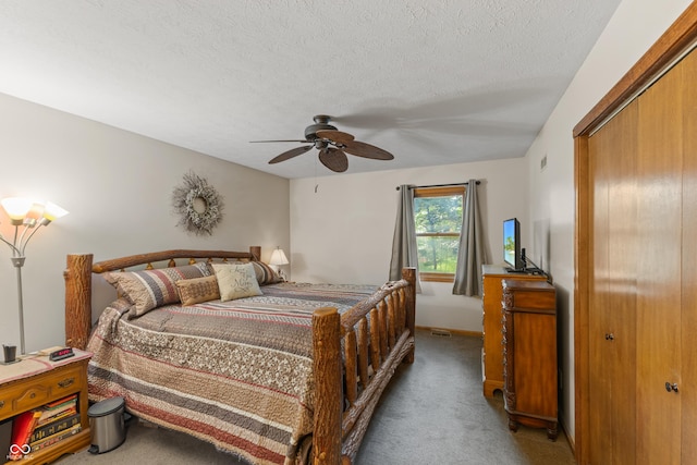 2591 S Glen Cv, Martinsville, IN 46151 - carpeted bedroom with a textured ceiling, a ceiling fan, and a closet