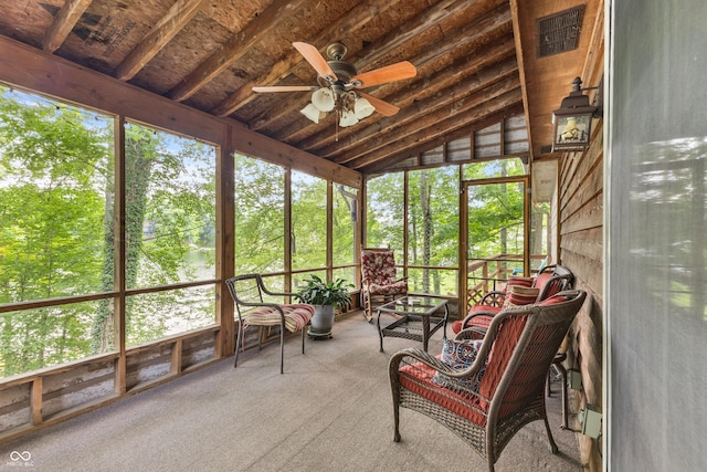 2591 S Glen Cv, Martinsville, IN 46151 - sunroom / solarium featuring a ceiling fan, healthy amount of natural light, lofted ceiling, and view of wooded area