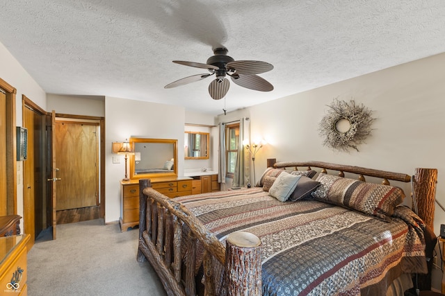 2591 S Glen Cv, Martinsville, IN 46151 - bedroom featuring light colored carpet, a textured ceiling, and ceiling fan