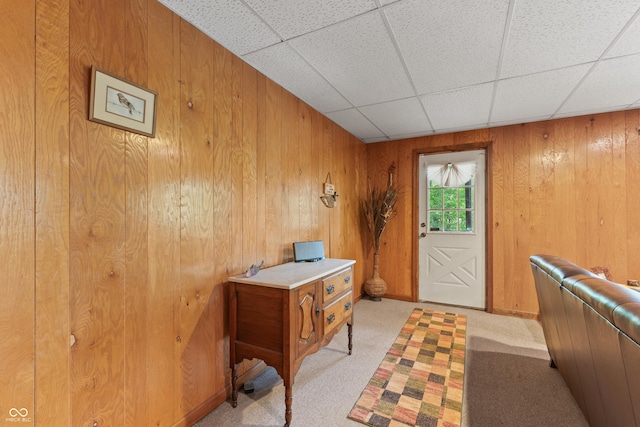 2591 S Glen Cv, Martinsville, IN 46151 - foyer entrance with wood walls, a drop ceiling, and light carpet