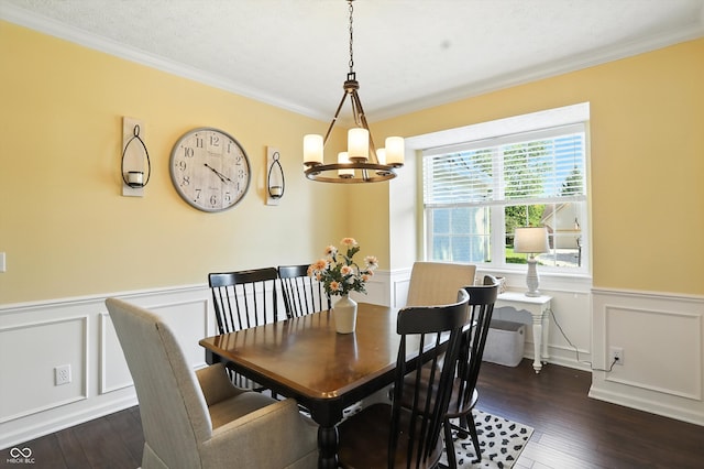 682 Shannon Ct, Noblesville, IN 46062 - dining area featuring a chandelier, crown molding, dark wood-style floors, a decorative wall, and wainscoting
