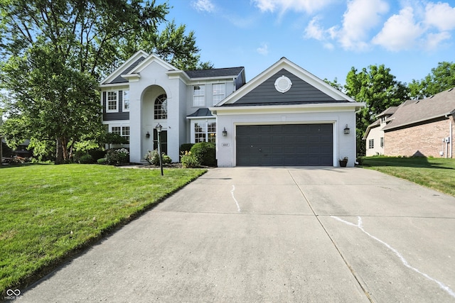 682 Shannon Ct, Noblesville, IN 46062 - traditional-style house featuring concrete driveway, a front yard, and an attached garage