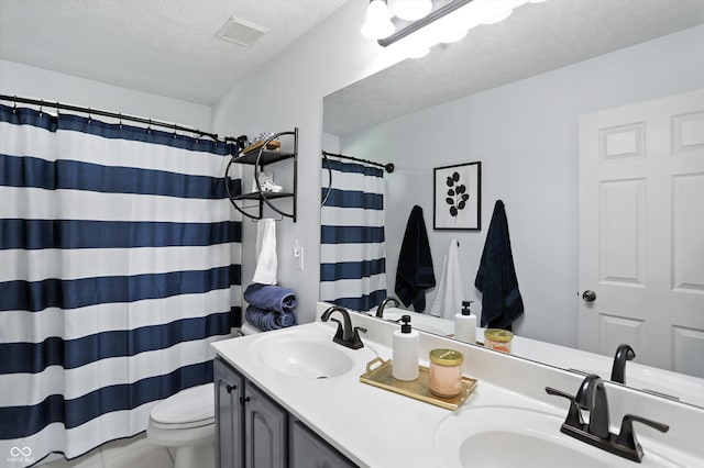 682 Shannon Ct, Noblesville, IN 46062 - full bath featuring double vanity, a textured ceiling, a shower with shower curtain, and tile patterned floors