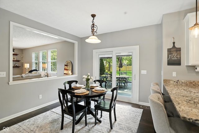 682 Shannon Ct, Noblesville, IN 46062 - dining room with baseboards and dark wood-style flooring