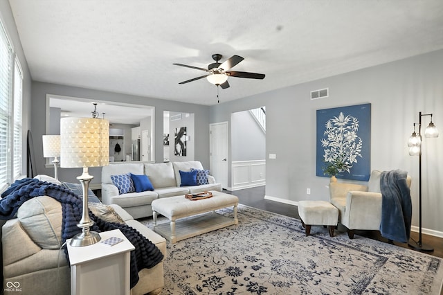 682 Shannon Ct, Noblesville, IN 46062 - living area with a ceiling fan and dark wood-type flooring