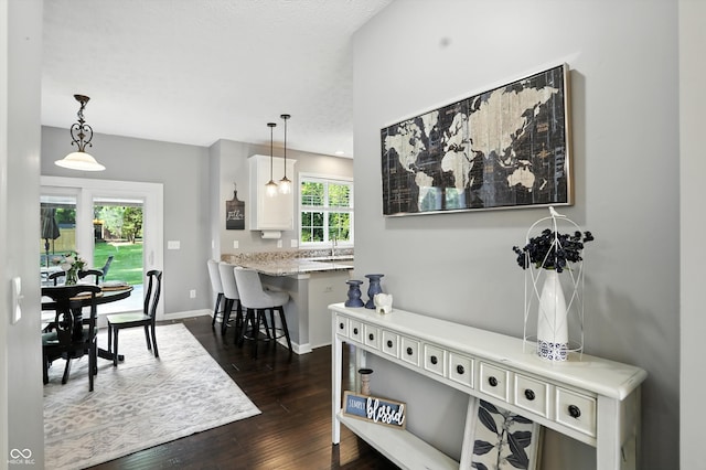 682 Shannon Ct, Noblesville, IN 46062 - dining space with dark wood-type flooring and baseboards