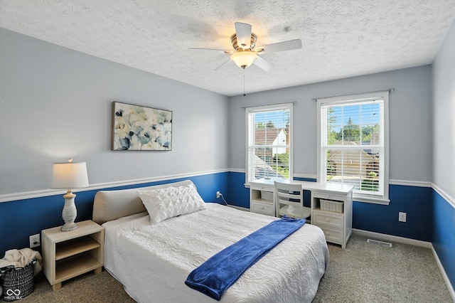 682 Shannon Ct, Noblesville, IN 46062 - carpeted bedroom with a textured ceiling and ceiling fan