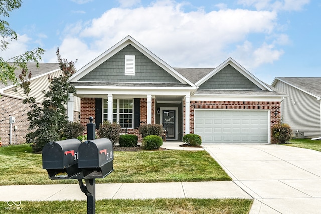 5119 Silverbell Dr, Plainfield, IN 46168 - view of front of property featuring brick siding, an attached garage, a front yard, driveway, and a porch