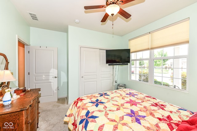 5119 Silverbell Dr, Plainfield, IN 46168 - bedroom featuring light colored carpet, a closet, and a ceiling fan