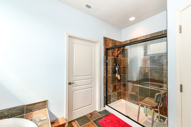 5119 Silverbell Dr, Plainfield, IN 46168 - bathroom with a shower stall, stone finish floors, and a bathtub