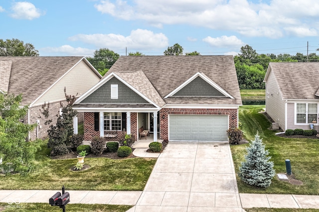 5119 Silverbell Dr, Plainfield, IN 46168 - view of front of home with brick siding, covered porch, an attached garage, a front lawn, and a shingled roof