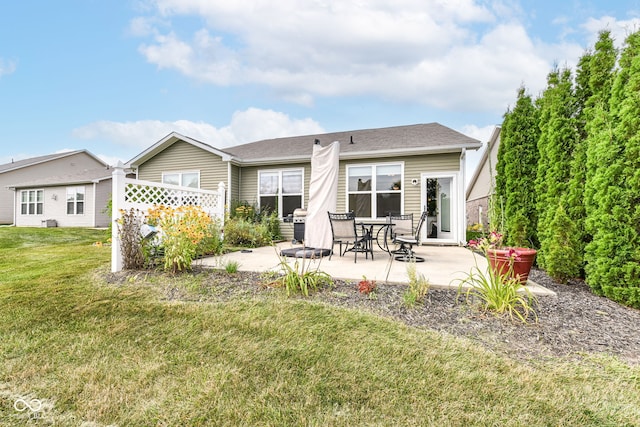 5119 Silverbell Dr, Plainfield, IN 46168 - back of house with a patio, a lawn, and a shingled roof