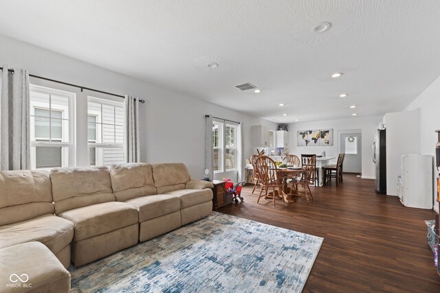 1830 Keller Ave, Columbus, IN 47201 - living room featuring dark wood-type flooring and recessed lighting