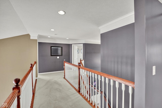 10267 Ranford Blvd, Fishers, IN 46040 - hallway featuring an upstairs landing, crown molding, carpet, recessed lighting, and a textured ceiling