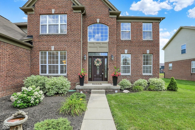 10267 Ranford Blvd, Fishers, IN 46040 - view of front facade with brick siding and a front lawn