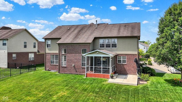 10267 Ranford Blvd, Fishers, IN 46040 - back of property with brick siding, a sunroom, a patio, and roof with shingles