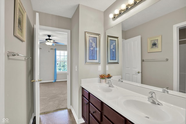 10267 Ranford Blvd, Fishers, IN 46040 - full bath featuring double vanity, a ceiling fan, and tile patterned flooring