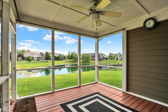 10267 Ranford Blvd, Fishers, IN 46040 - unfurnished sunroom featuring a water view, a ceiling fan, and a residential view