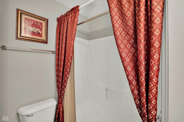 10267 Ranford Blvd, Fishers, IN 46040 - bathroom featuring toilet and shower / tub combo with curtain