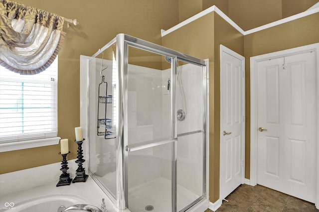 10267 Ranford Blvd, Fishers, IN 46040 - bathroom featuring a shower stall and a garden tub