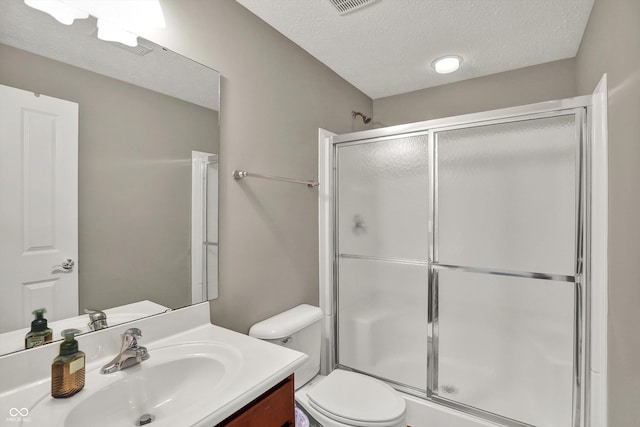 10267 Ranford Blvd, Fishers, IN 46040 - bathroom featuring a shower stall, vanity, and a textured ceiling