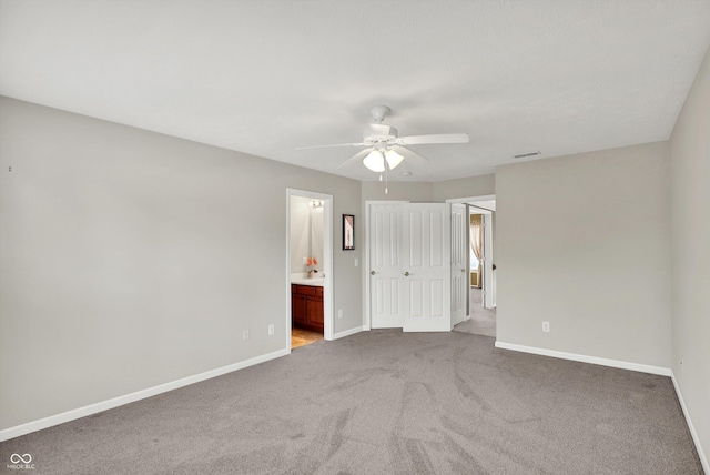 10267 Ranford Blvd, Fishers, IN 46040 - unfurnished bedroom featuring carpet floors, connected bathroom, and a ceiling fan