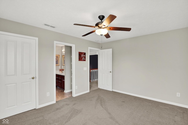 10267 Ranford Blvd, Fishers, IN 46040 - unfurnished bedroom featuring carpet flooring, connected bathroom, and ceiling fan