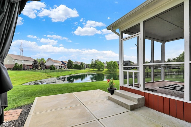 10267 Ranford Blvd, Fishers, IN 46040 - view of patio featuring a sunroom, a water view, and a residential view