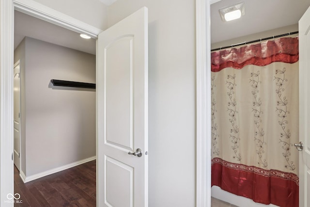 7927 Broadmead Way, Indianapolis, IN 46259 - bathroom featuring wood finished floors and a shower with curtain