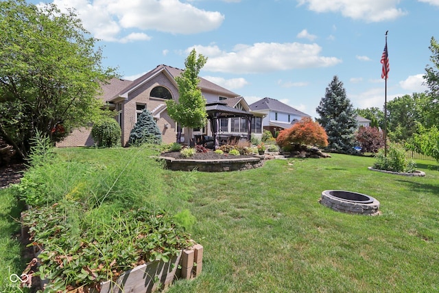 7927 Broadmead Way, Indianapolis, IN 46259 - view of grassy yard with a gazebo and an outdoor fire pit