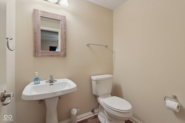 7927 Broadmead Way, Indianapolis, IN 46259 - half bathroom with toilet and baseboards