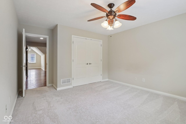 7927 Broadmead Way, Indianapolis, IN 46259 - unfurnished bedroom featuring light colored carpet and a ceiling fan