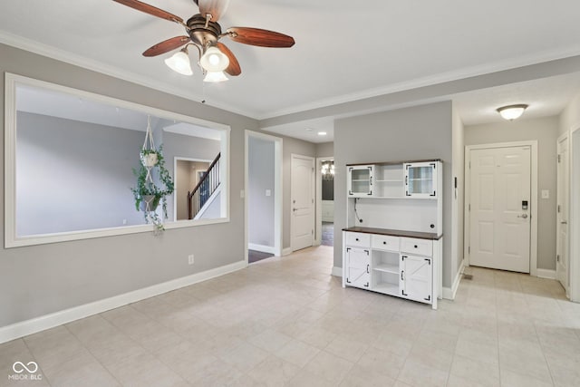 7927 Broadmead Way, Indianapolis, IN 46259 - unfurnished living room with a ceiling fan and ornamental molding