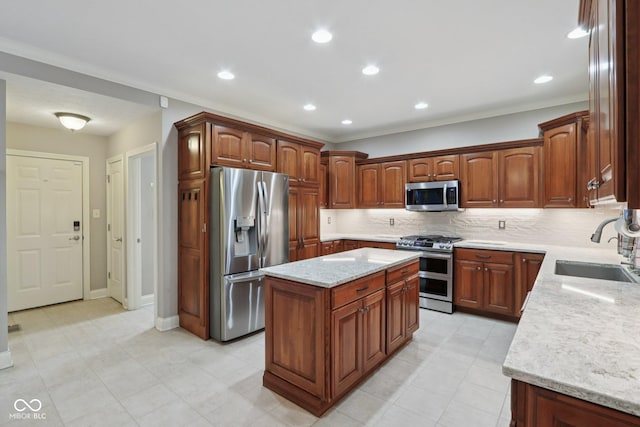 7927 Broadmead Way, Indianapolis, IN 46259 - kitchen featuring appliances with stainless steel finishes, decorative backsplash, light stone countertops, a center island, and light tile patterned floors