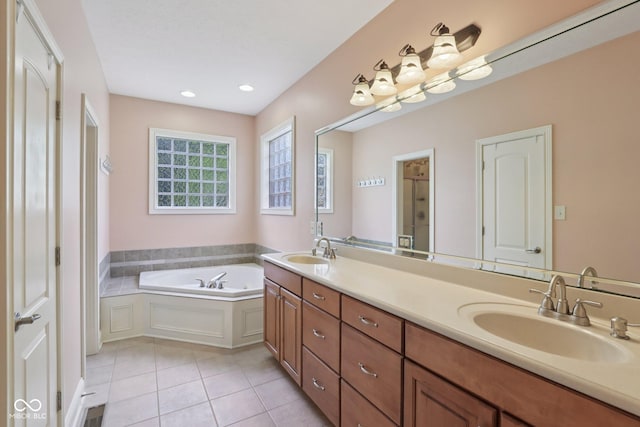 7927 Broadmead Way, Indianapolis, IN 46259 - bathroom with double vanity, tile patterned floors, a garden tub, and recessed lighting