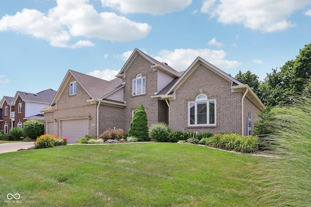 7927 Broadmead Way, Indianapolis, IN 46259 - traditional-style home featuring brick siding, a front lawn, driveway, and an attached garage