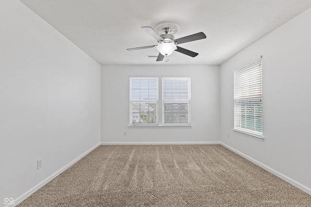 2833 Holiday Way, Greenwood, IN 46143 - carpeted spare room with ceiling fan and baseboards