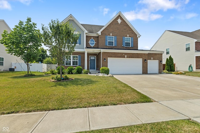 2833 Holiday Way, Greenwood, IN 46143 - view of front facade with brick siding, driveway, and a garage